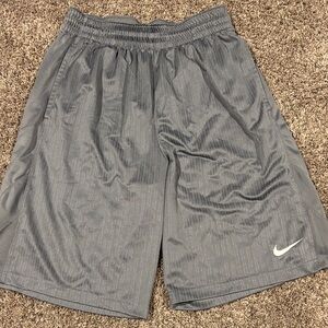 Nike Gray Athletic Shorts with Black Swoosh